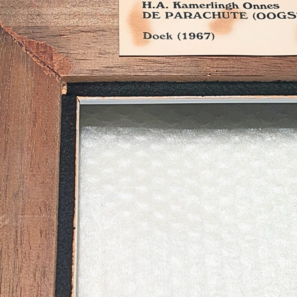 schade aan schilderij door verkeerde inlijsting schilderijenrestaurateur restaurateur atelier Iddi